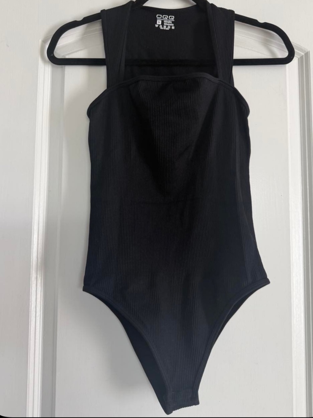 Women’s OQQ Black Ribbed One-Piece Bodysuit